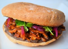 Vegan Pibil Torta Sandwich on a white counter.