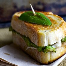 A delicious vegan sandwich with sliced jalapeños and vegan cheese