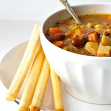 Minestrone Quinoa Soup is one of our favorite weeknight meals because it's easy to make, so tasty, and we have leftovers for the week. Did I say it's pretty cheap to make too? Perfection!