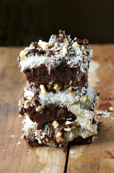 Coconut Brownies are stacked three high!