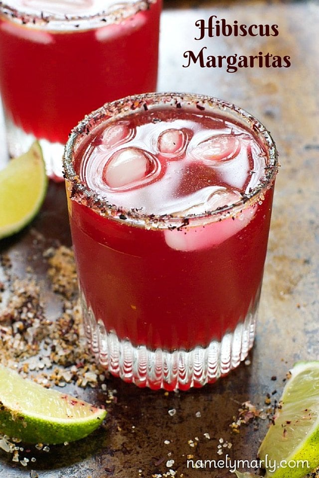 Two glasses of a bright red cocktail and the words, "Hibiscus Margaritas" at the top.