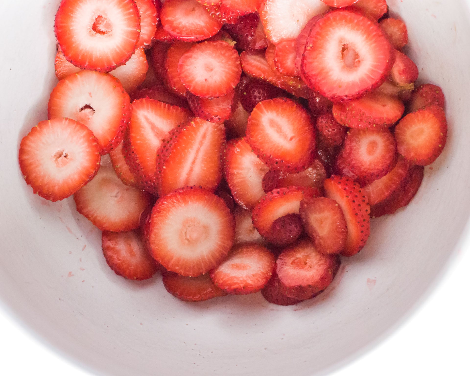 Cut strawberries for strawberry shortcake