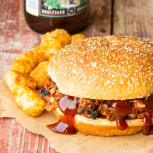 This super easy vegan recipe is prepared in a crockpot and results in the most delicious Slow Cooker BBQ Pulled Jackfruit ever. Jackfruit is a perfect plant-based substitute for pork. We pile the BBQ Pulled Jackfruit on sandwiches. SO good!