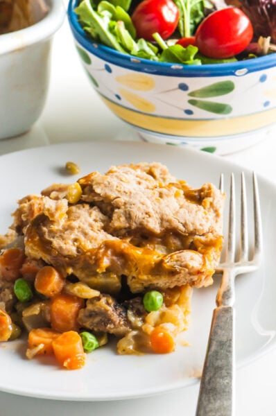 Beefless Vegan Pot Pie Casserole with a cheesy biscuit topping is a delicious weekday treat any night of the week!