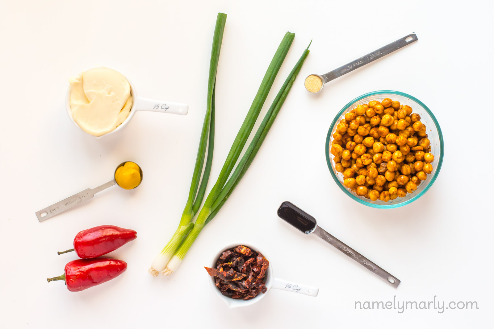 Looking down on vegan deviled ham spread ingredients, such as green onions, vegan mayo, and more.