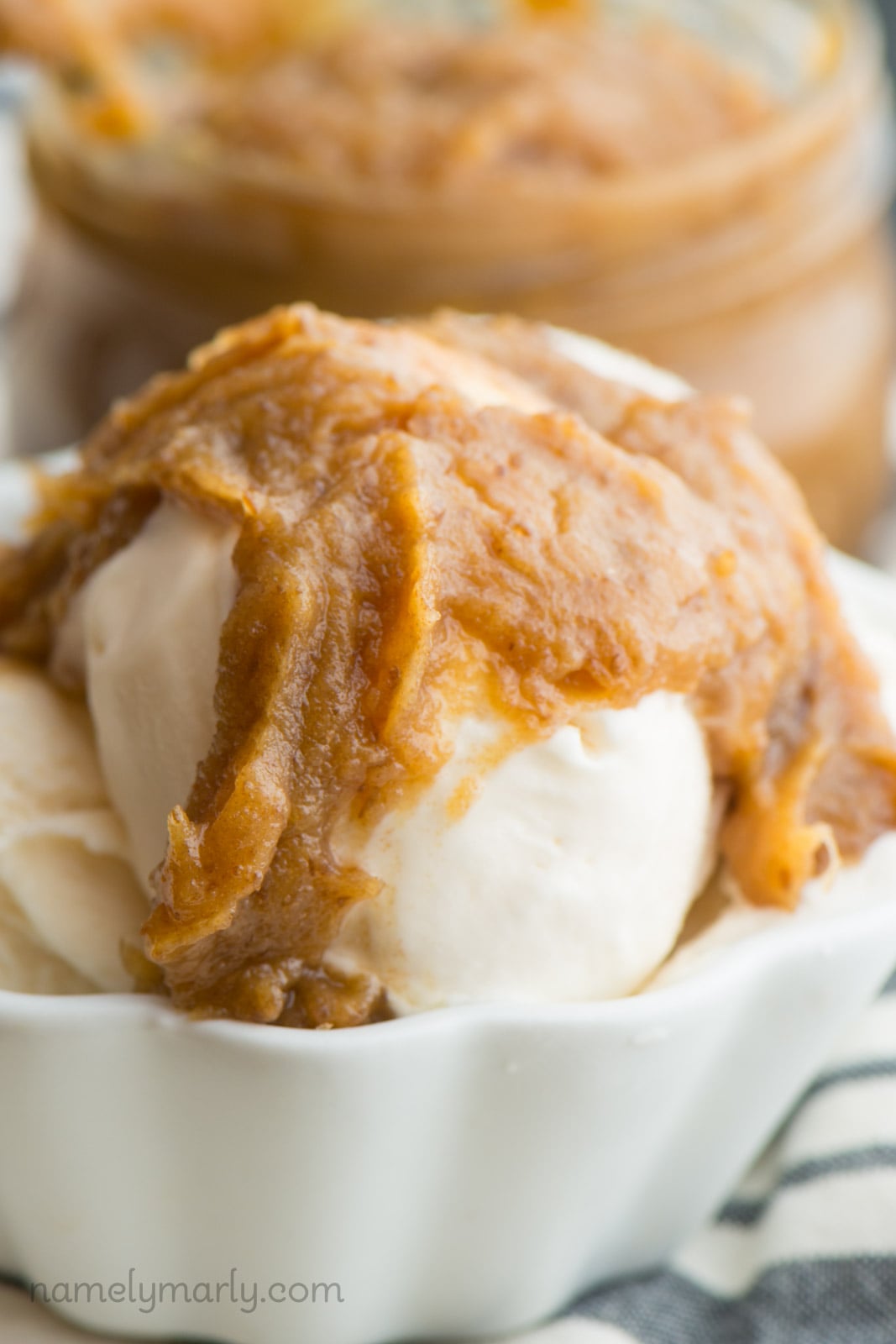 Vegan date caramel sauce drizzled over ice cream.