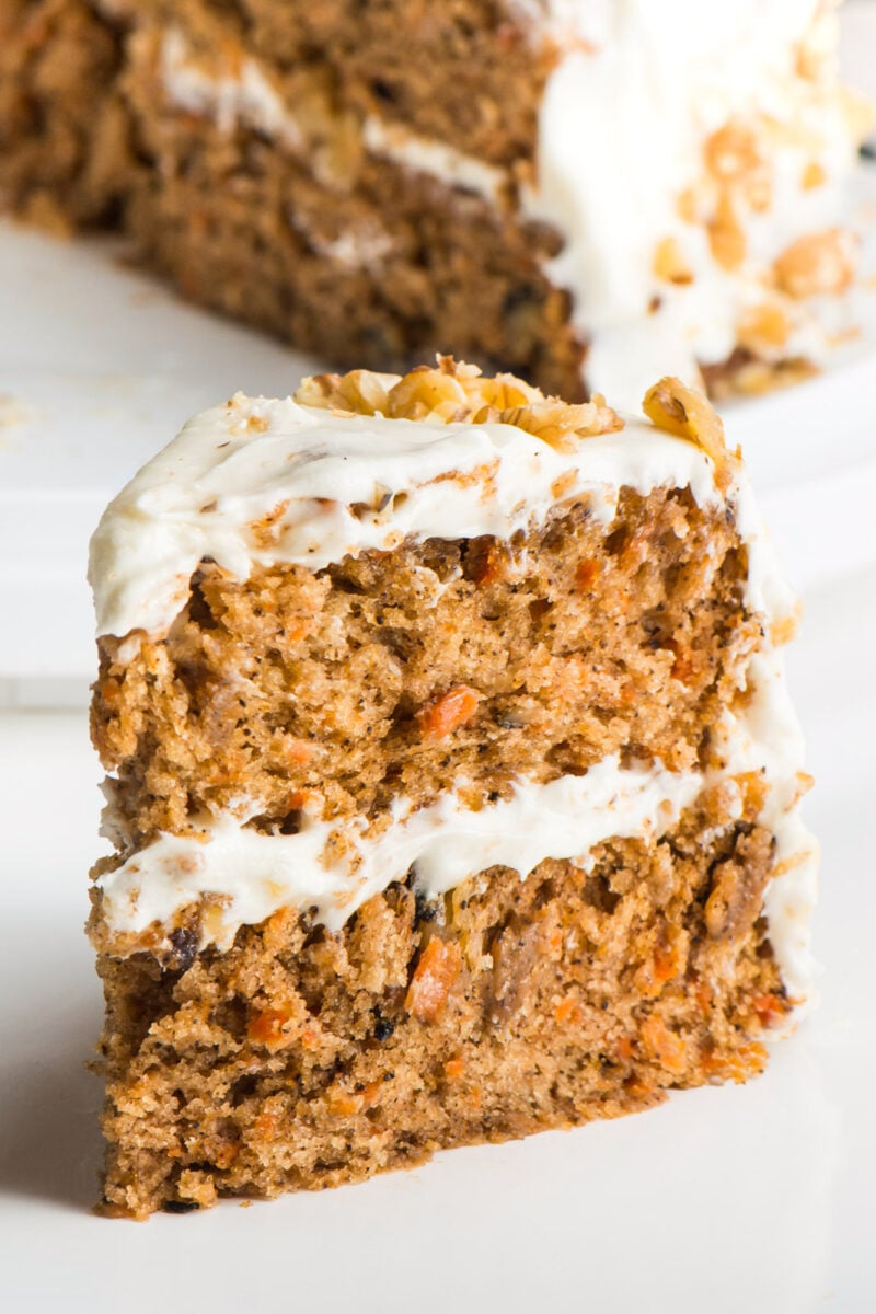 Vegan Carrot Cake with layers of delicious cake topped with vegan cream cheese frosting.