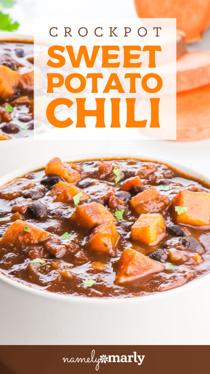 Bowl of sweet potato chili topped with herbs, surrounded by ingredients, on a light background.