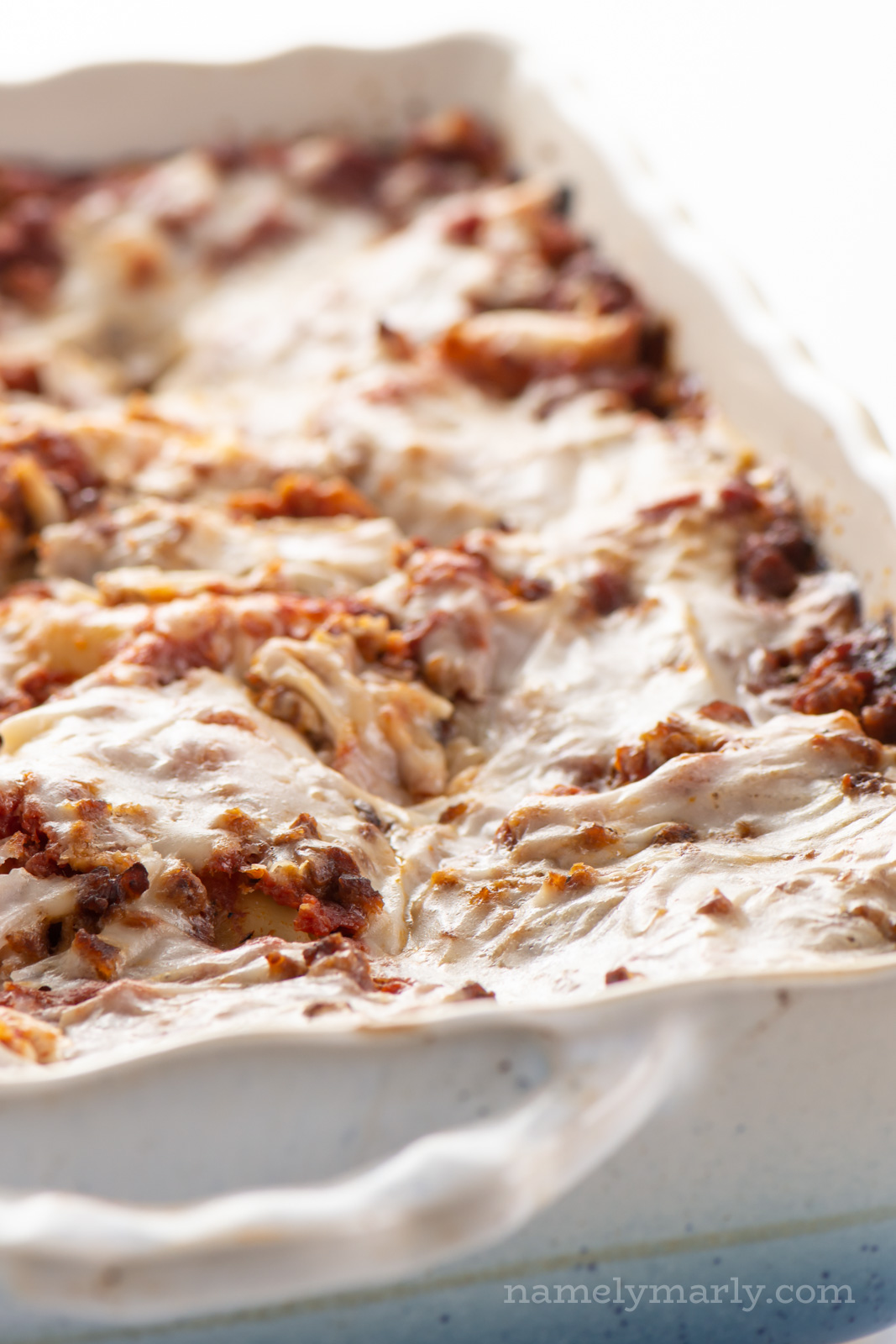 A casserole dish full of a pasta dish fresh from the oven.