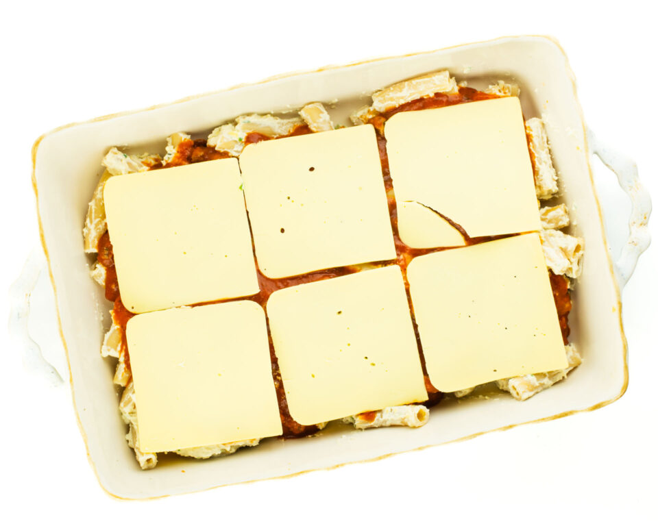 Looking down on a 9X13 casserole dish with unbaked meatless ziti.