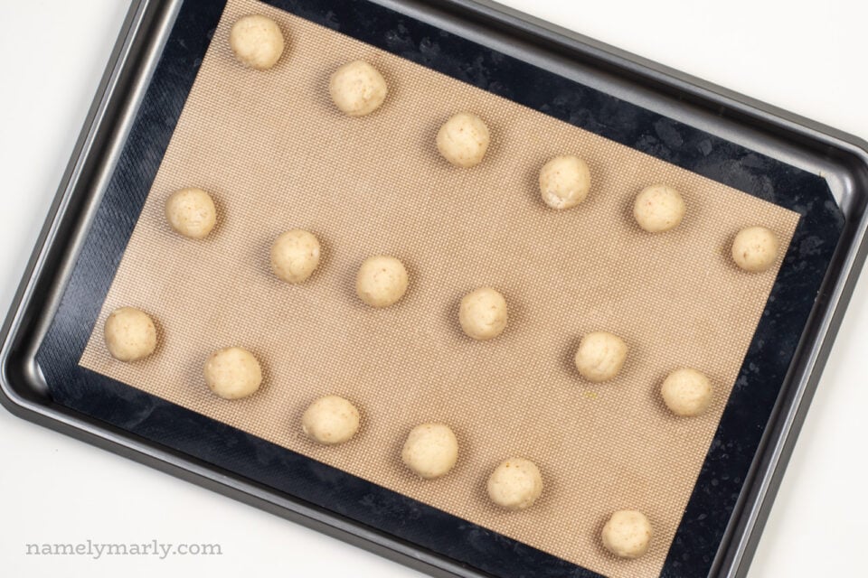 Cookie dough balls on a cookie dough pan.