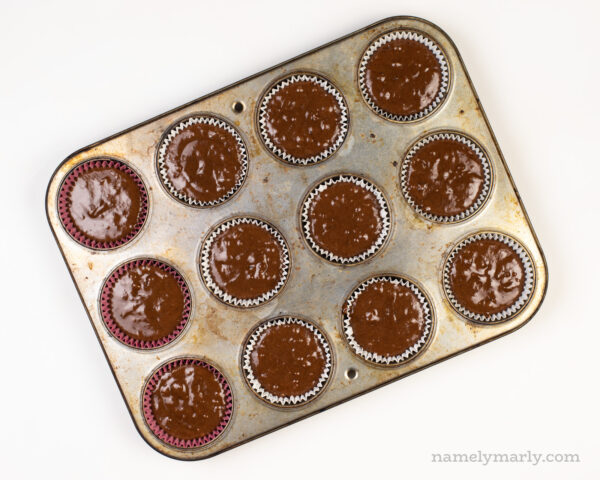 Cupcakes in a pan ready to go into the oven.