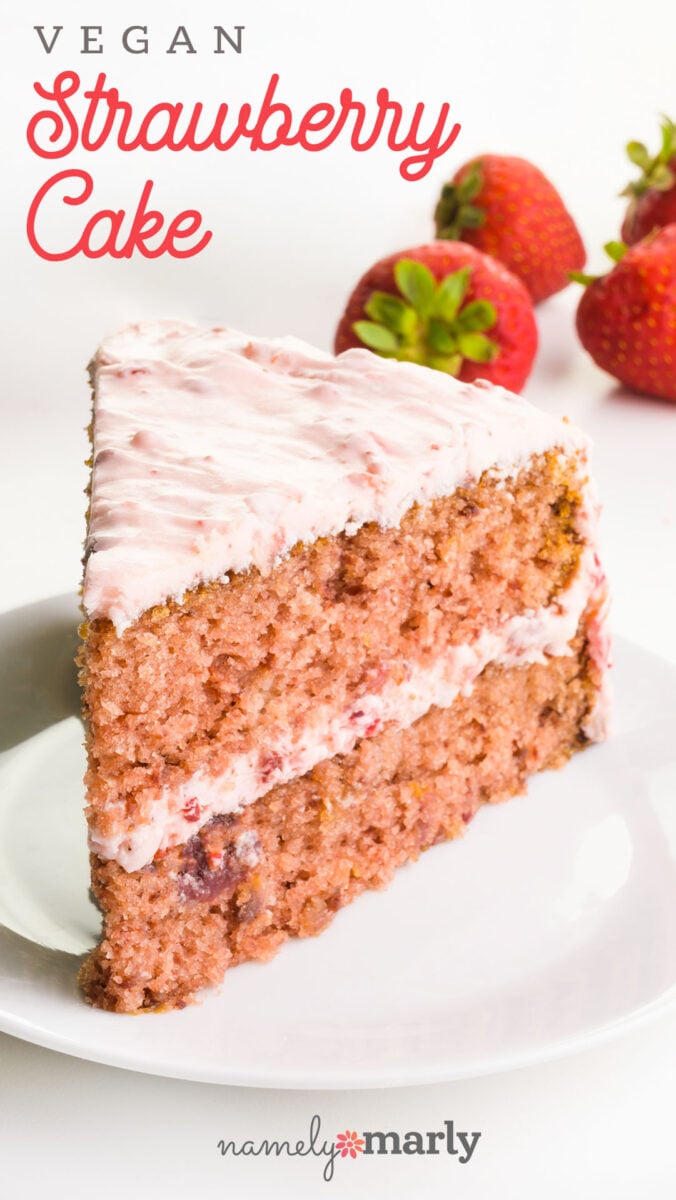 A slice of cake on a plate has this text on top, Vegan Strawberry Cake.