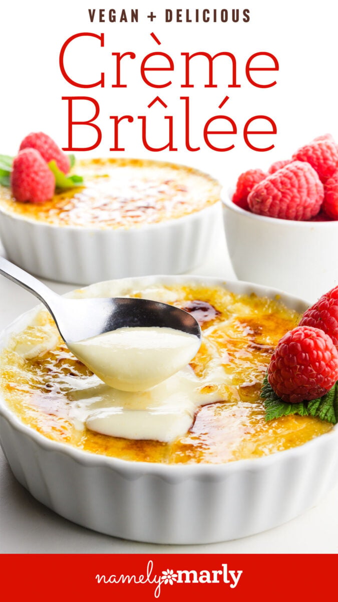 Vegan crème brûlée topped with raspberries and a spoonful being lifted from the dish, with a bright background.