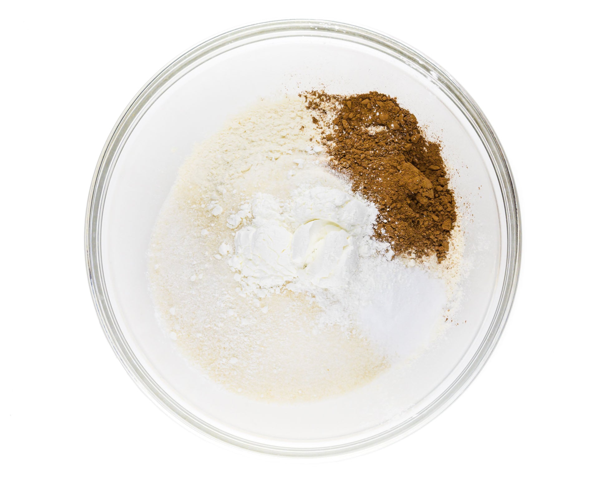 Ingredients for a cake are in a mixing bowl.