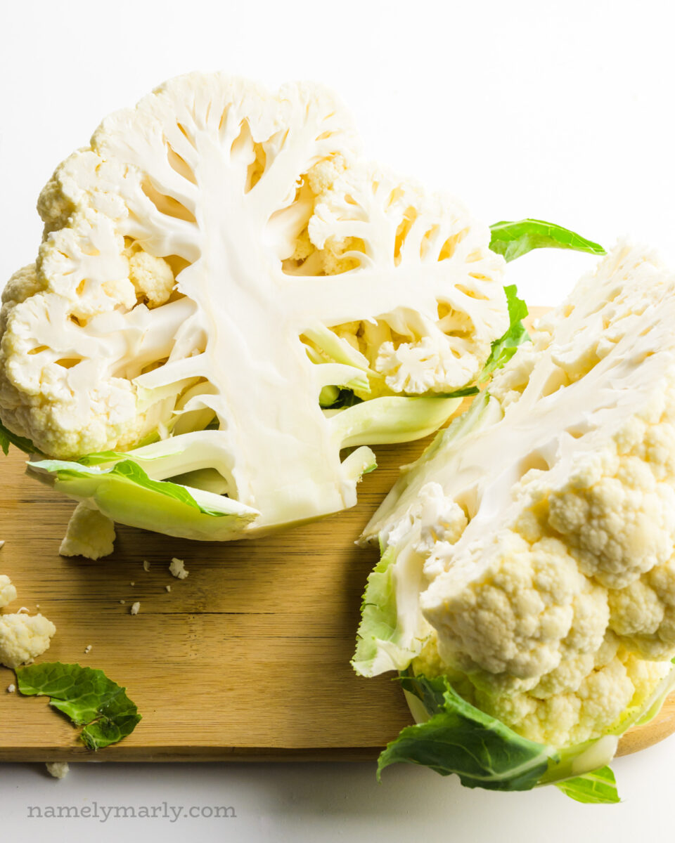 A head of cauliflower has been chopped in half.