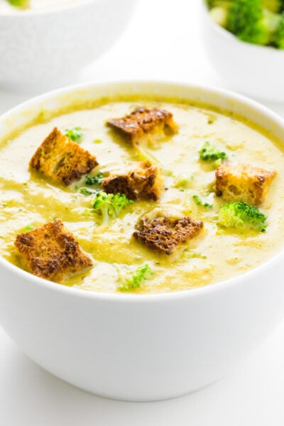 A close-up of a bowl of creamy broccoli soup.
