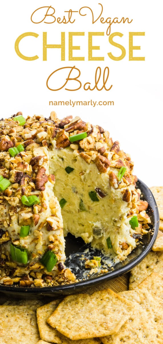 A cheese ball on a plate next to crackers has this text on top: Best Vegan Cheese Ball.