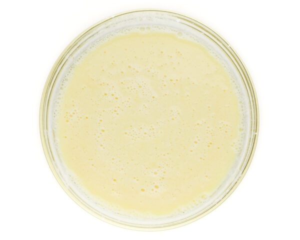 A bowl full of liquid ingredients.