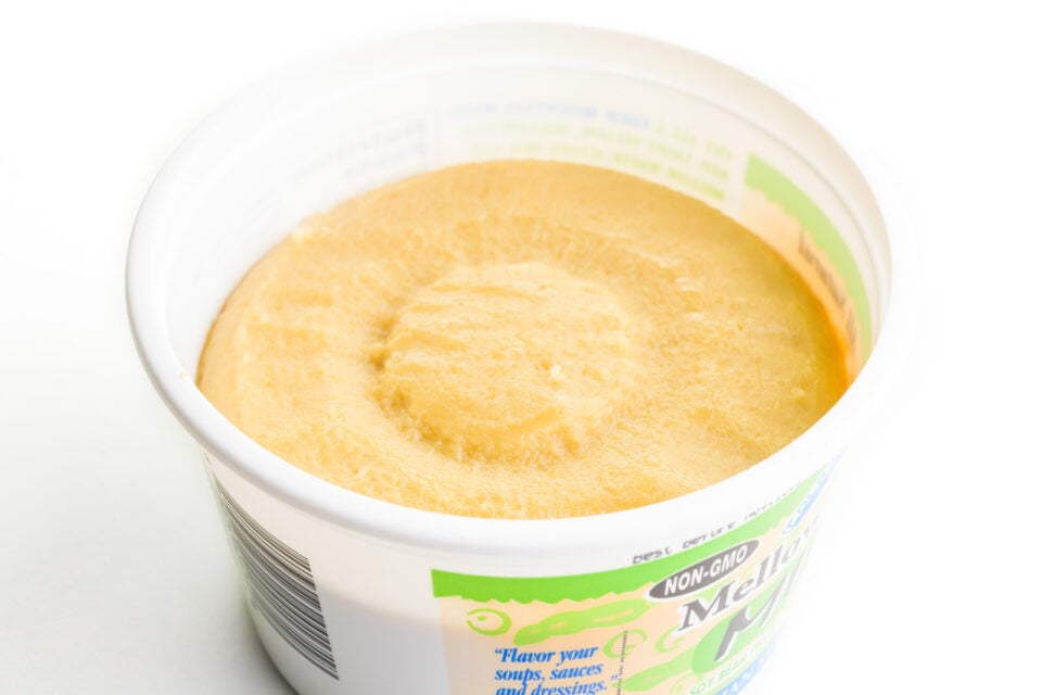 Looking into a container of mild miso paste.