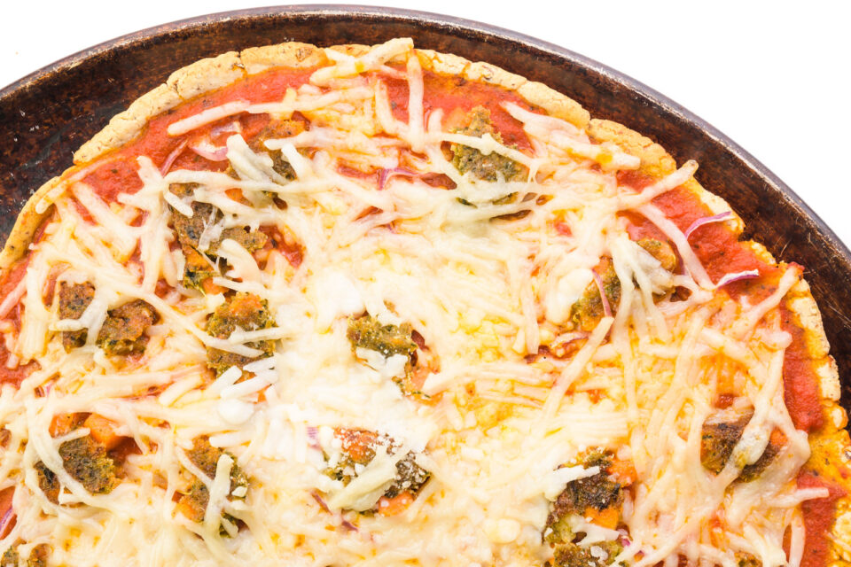Looking down on a pizza on a pizza pan.
