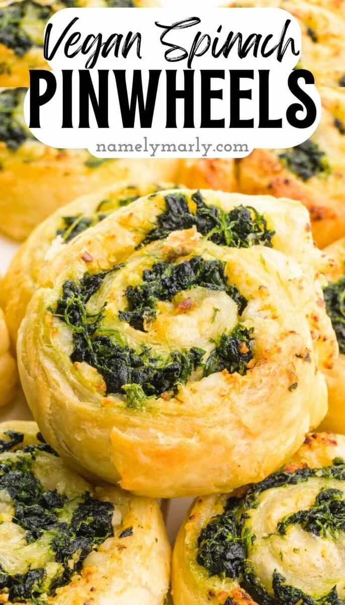 Vegan spinach pinwheels with a flaky crust and a flavorful spinach filling displayed in a close-up view.
