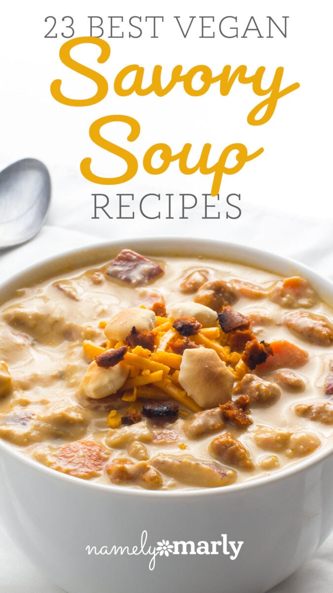 Vegan savory soup topped with shredded cheese and croutons in a white bowl, with a spoon beside it.