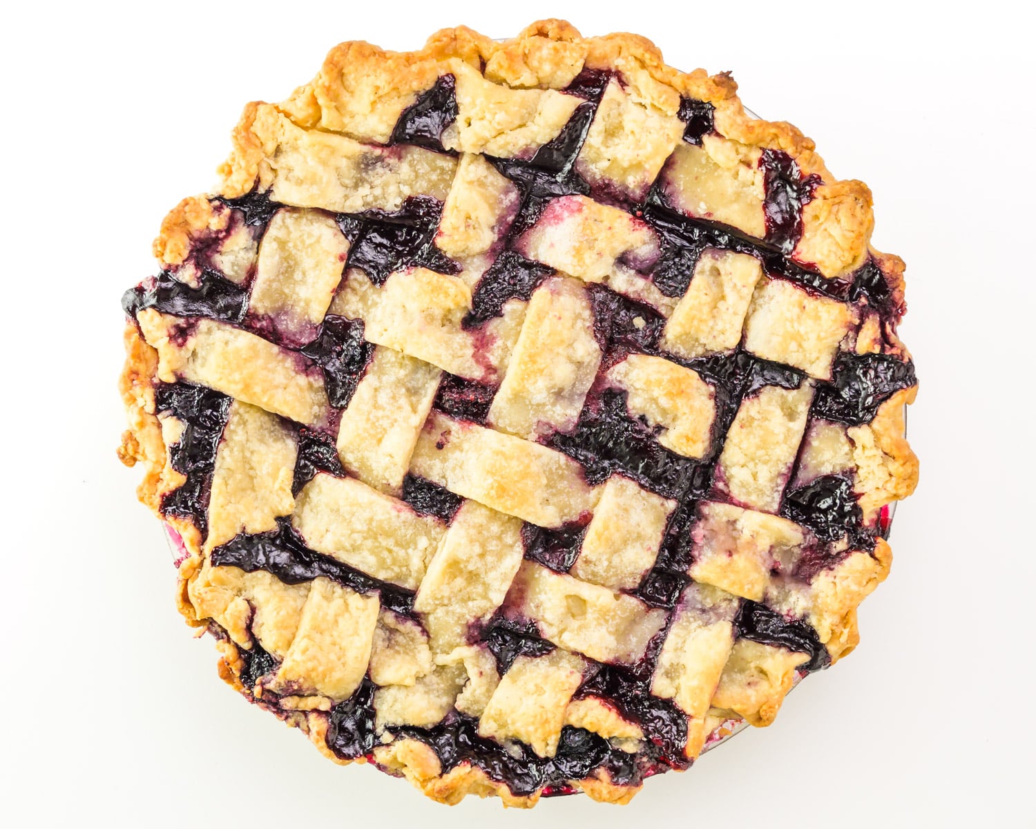 Looking down on a freshly baked pie with a lattice topping.