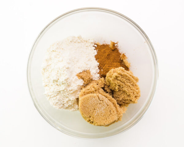Ingredients for coffee cake filling are in a bowl, including brown sugar and flour.