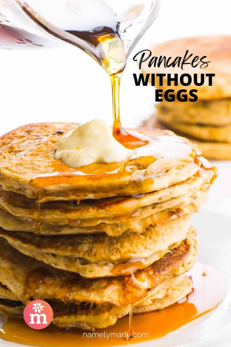 Syrup is being poured over a stack of pancakes. The text reads, Pancakes Without Eggs.