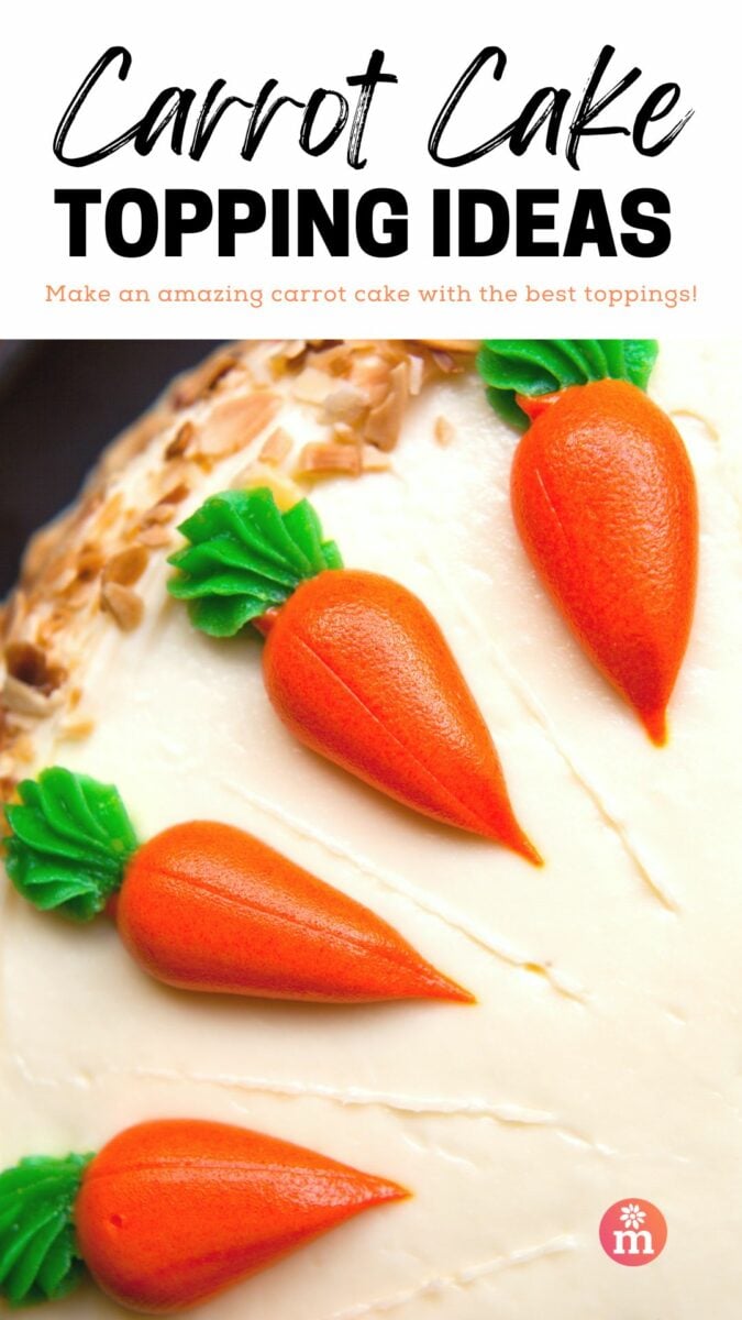 Colorful carrot-shaped decorations on cream frosting, topped with coconut flakes on a carrot cake.