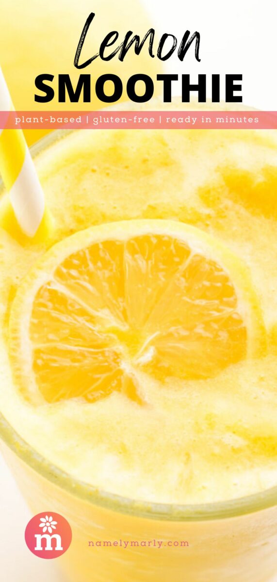 Bright yellow lemon smoothie topped with a lemon slice and served with a striped straw.