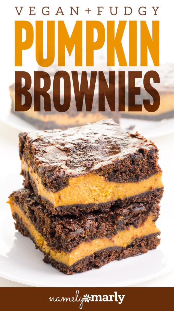 Vegan pumpkin brownies with layered fudgy chocolate and creamy pumpkin filling on a white plate.