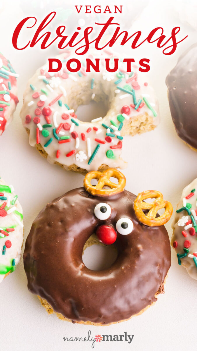 Vegan Christmas Donuts with image looking down on several baked donuts with Christmas toppings