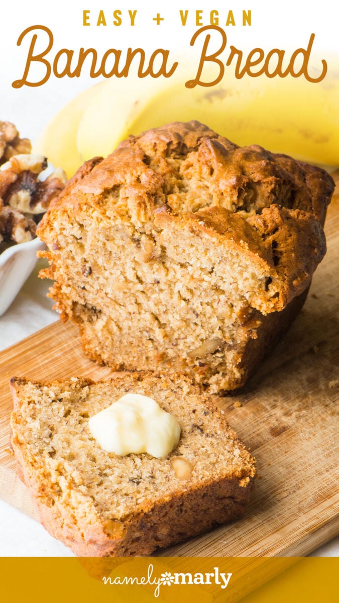 Sliced banana bread topped with a dollop of butter, with bananas and walnuts in the background.