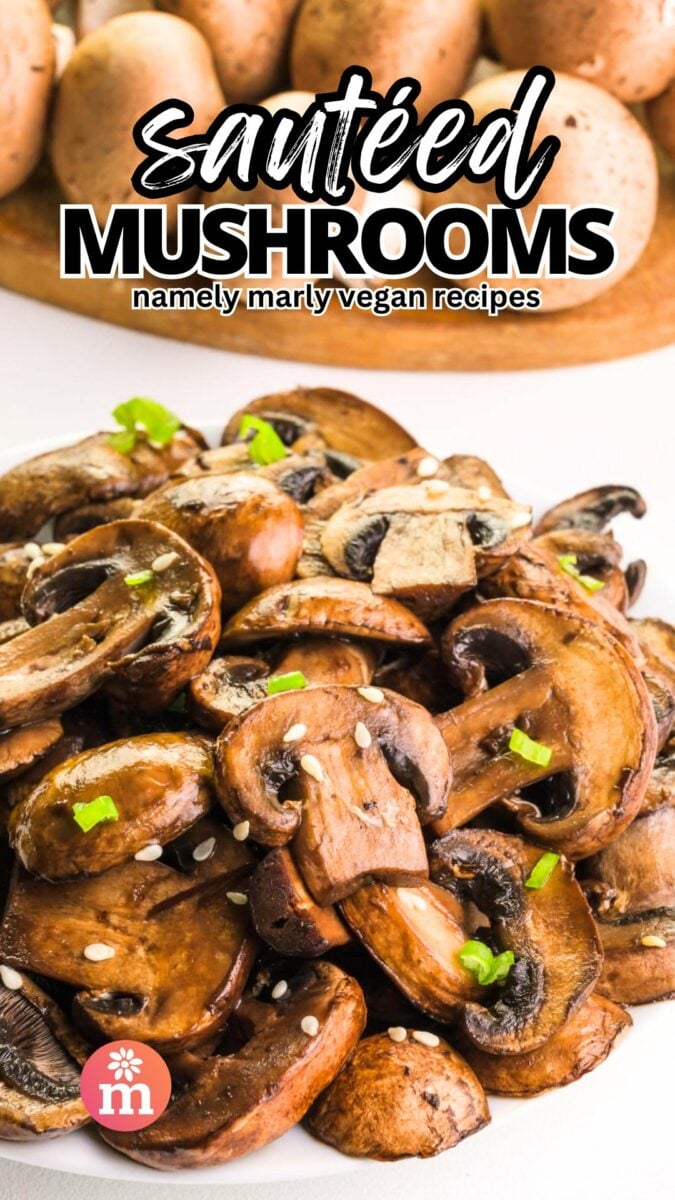 A plate of cooked mushrooms shows whole mushrooms on a cutting board in the background. The text reads, Sautéed Mushrooms, Namely Marly Vegan Recipes.