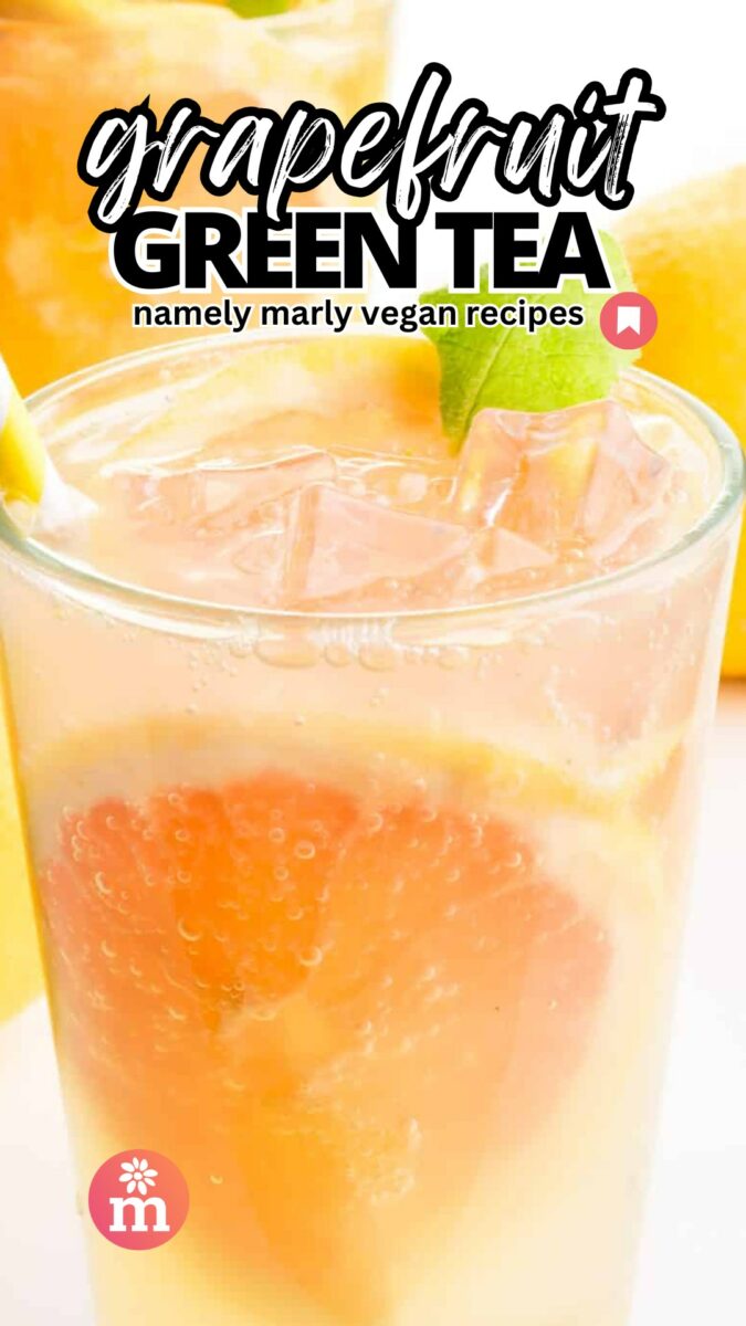 A glass of tea has grapefruit slices in it. The text reads, Grapefruit Green Tea, Namely Marly Vegan Recipes.