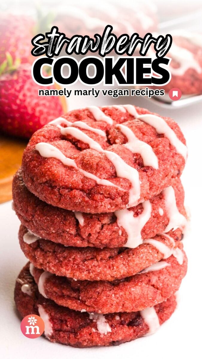 A stack of pink cookies with white frosting drizzles has this text over it, Strawberry Cookies; Namely Marly Vegan Recipes.