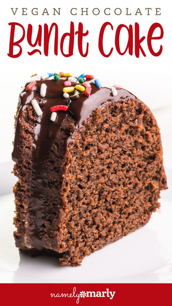 Slice of vegan chocolate bundt cake topped with chocolate glaze and colorful sprinkles.
