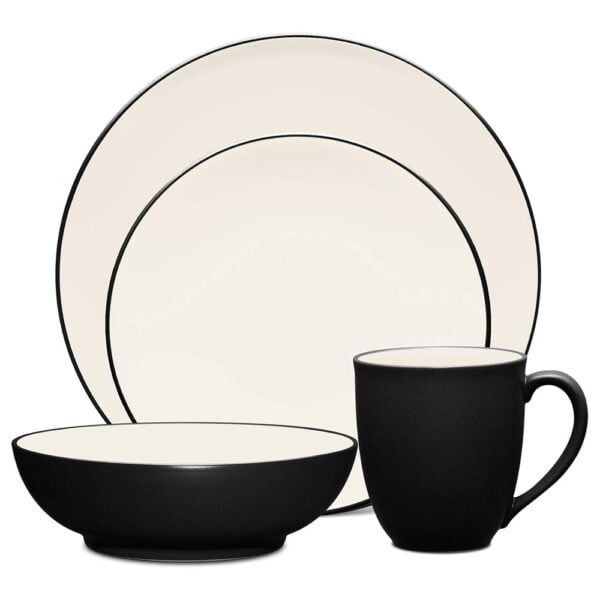 white and black plates with a bowl and coffee cup