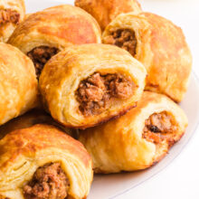 Vegan sausage rolls on a plate.
