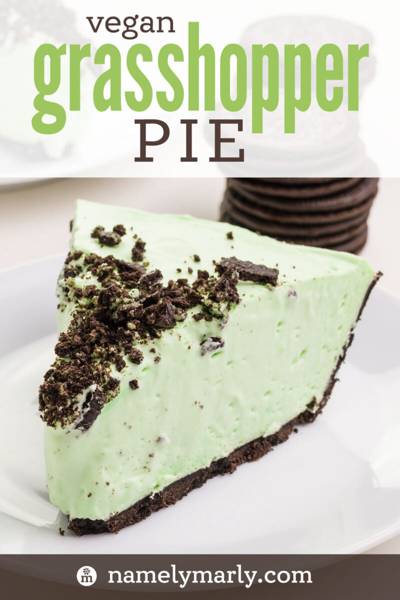 Vegan grasshopper pie slice on a white plate, topped with crushed cookies.