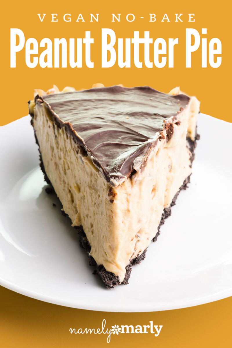 Slice of vegan no-bake peanut butter pie on a white plate against an orange background.