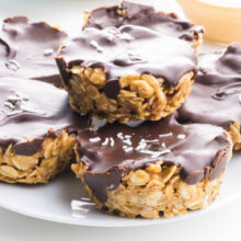 A stack of peanut butter oatmeal cups on a plate.