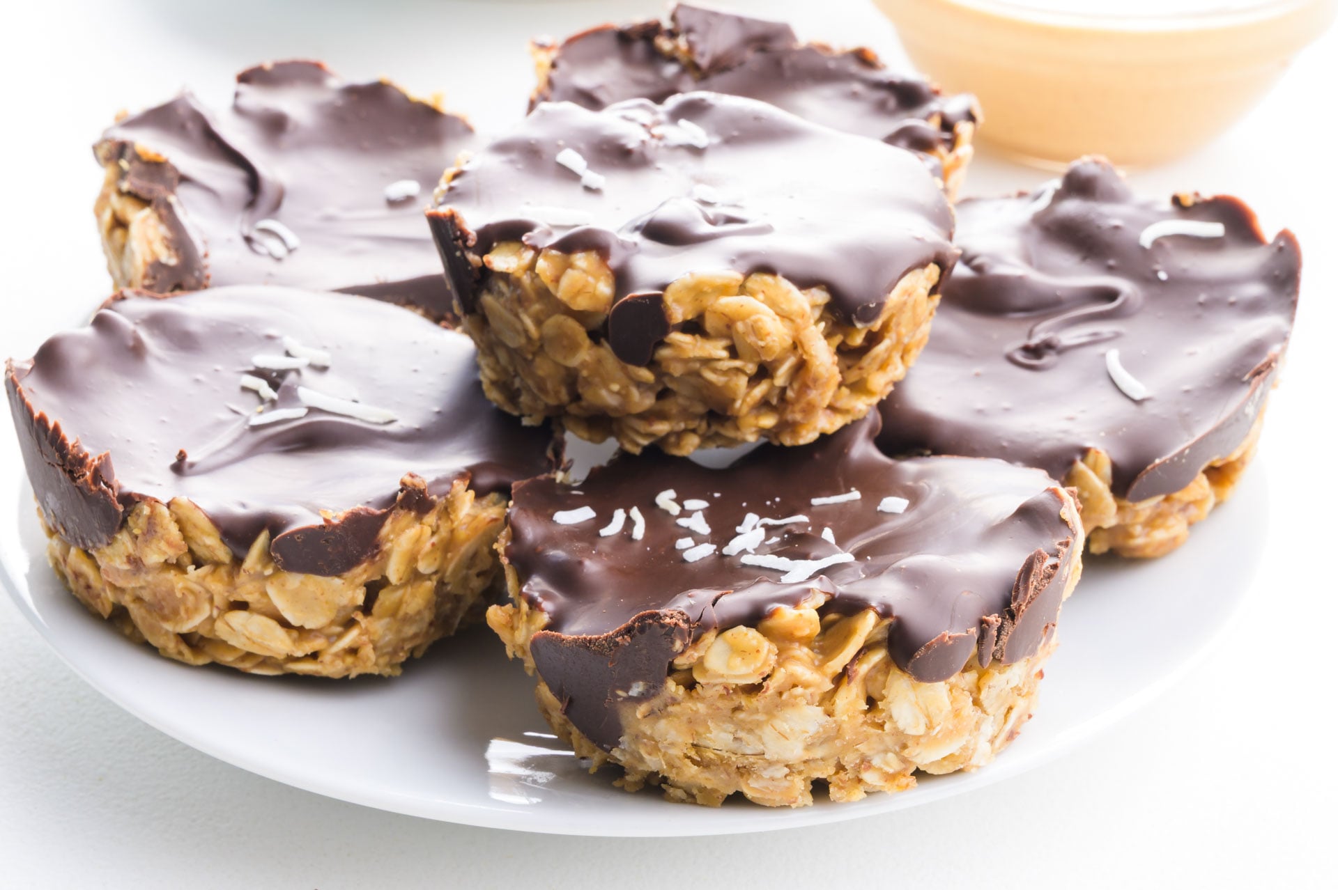 A stack of peanut butter oatmeal cups on a plate.